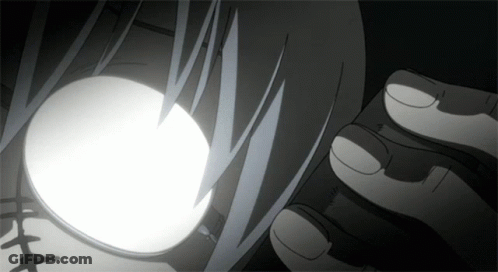 Black And White Drawing Of Face With Glowing Eye GIF