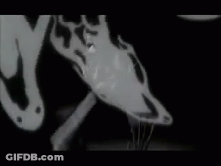 Black And White Drawing Of Man And Woman Kissing GIF
