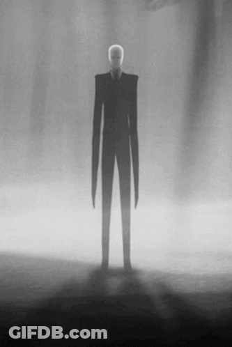 Black And White Drawing Of Slender Man In Suit GIF