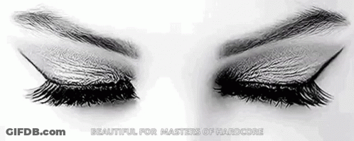 Black And White Drawing Of Woman's Eyes With Long Eyelashes Closed GIF