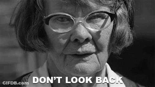 Black And White Elderly Woman With Glasses Don't Look Back GIF