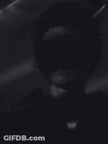 Black And White Face In The Dark GIF