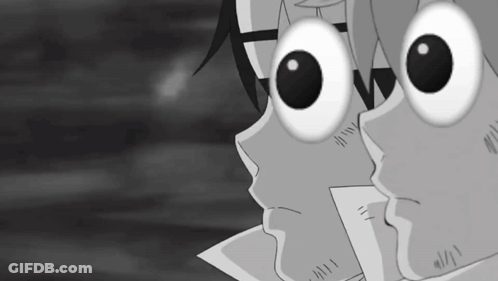 Black And White Face With Large Eyes GIF