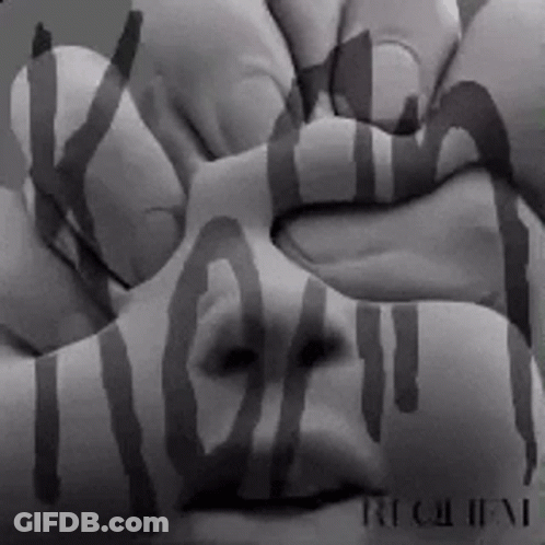Black And White Face With Requiem Painted On It GIF