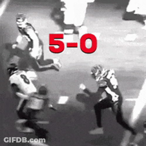 Black And White Football Players Score 5-0 GIF