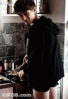 Black And White Frying Pan With Yellow Egg GIF