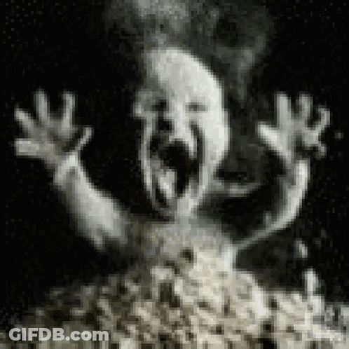 Black And White Ghost Screaming From Popcorn GIF