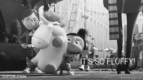 Black And White Girl Holding Stuffed Unicorn It's So Fluffy GIF