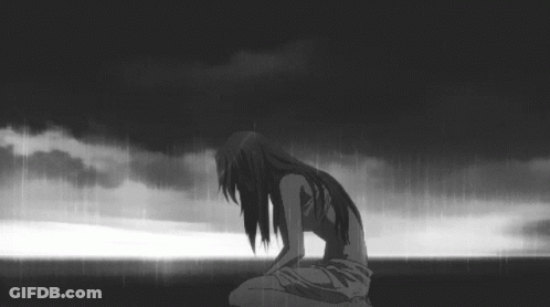 Black And White Girl Kneeling In The Rain GIF