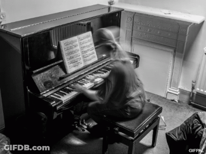 Black And White Girl Playing Piano GIF