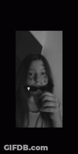 Black And White Girl Taking Selfie GIF