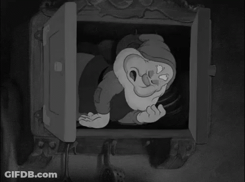 Black And White Gnome Looking Out Window GIF