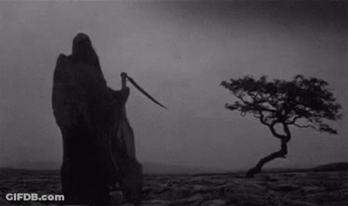 Black And White Grim Reaper Holding Scythe GIF