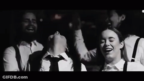 Black And White Group Laughing And Dancing GIF