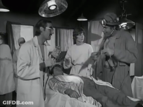 Black And White Group Talking To Patient GIF