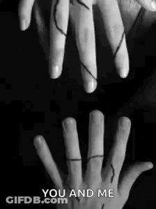 Black And White Hands Holding With String GIF
