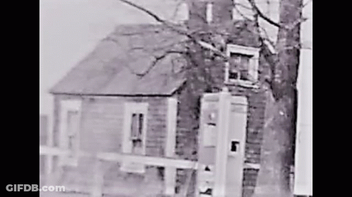 Black And White House With Fence GIF
