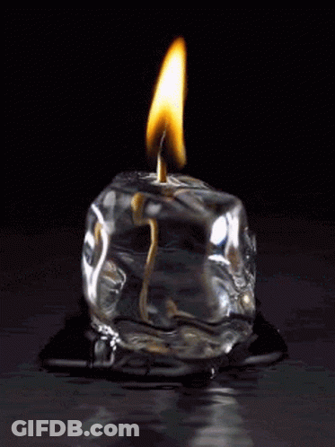 Black And White Ice Cube On Table GIF
