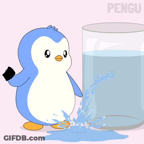 Black And White Igloo In Glass Of Water With Pengu GIF