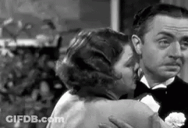 Black And White Man And Woman Hugging GIF