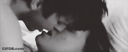 Black And White Man And Woman Kissing GIF