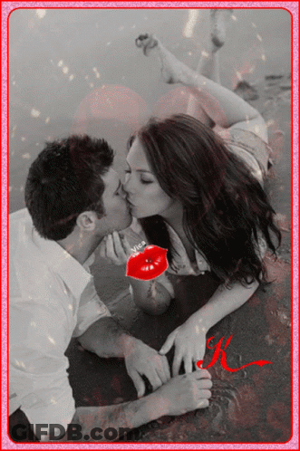 Black And White Man And Woman Kissing With Letter K GIF