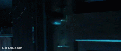 Black And White Man And Woman Laying On Ground GIF