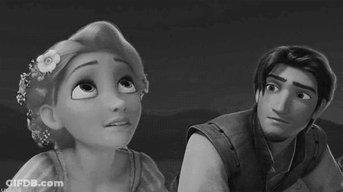 Black And White Man And Woman Looking At Each Other GIF