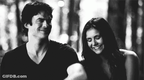 Black And White Man And Woman Smiling GIF