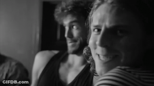 Black And White Man And Woman Smiling GIF