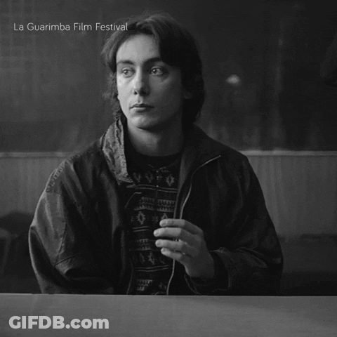Black And White Man At Table La Guarimba Film Festival GIF