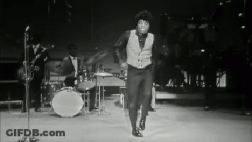 Black And White Man Dancing On Stage GIF