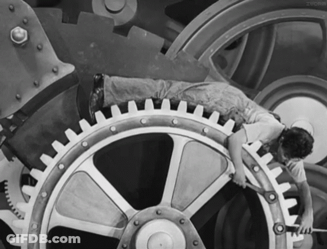 Black And White Man Fixing Gears GIF