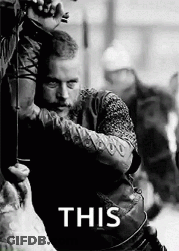 Black And White Man Holding Bow And Arrow Saying This GIF