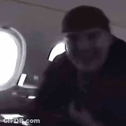 Black And White Man Holding Gun GIF