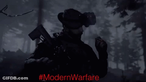 Black And White Man Holding Gun With ModernWarfare Red Text GIF