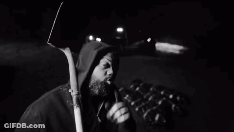 Black And White Man Holding Shovel GIF
