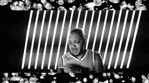 Black And White Man In Basketball Jersey Pointing GIF