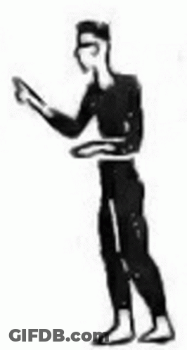 Black And White Man In Black Jumpsuit Holding Gun GIF