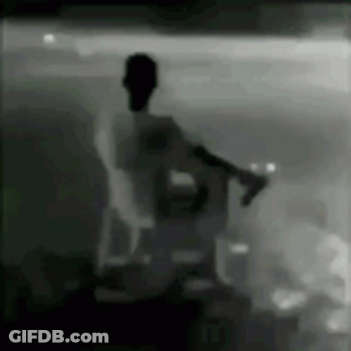 Black And White Man In Chair GIF