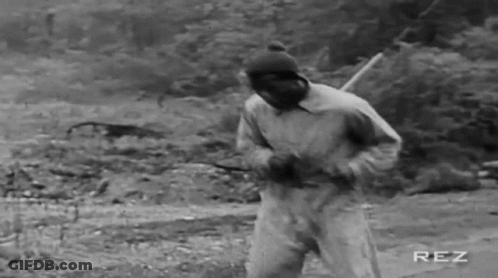 Black And White Man In Field With Rez GIF