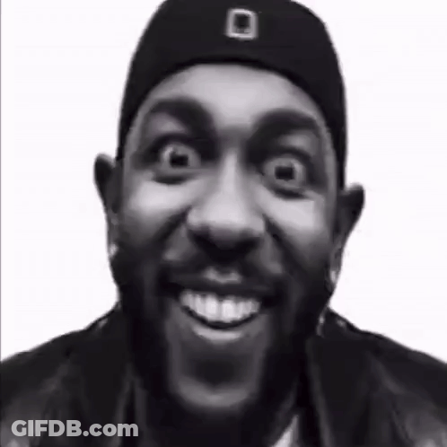 Black And White Man In Hat And Jacket Making Funny Face GIF
