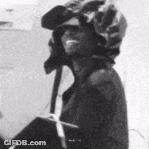 Black And White Man In Helmet And Sunglasses GIF