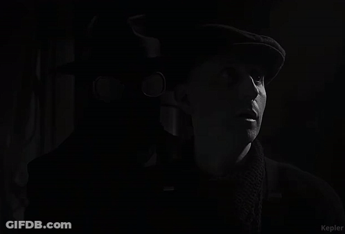 Black And White Man In Mask And Hat GIF