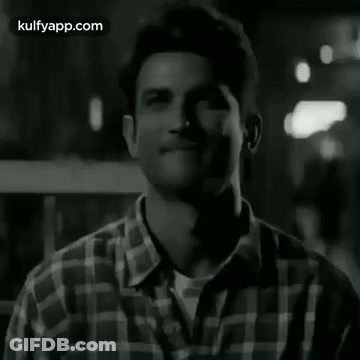 Black And White Man In Plaid Shirt GIF