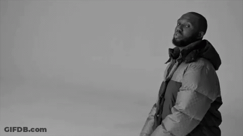 Black And White Man In Puffer Jacket GIF