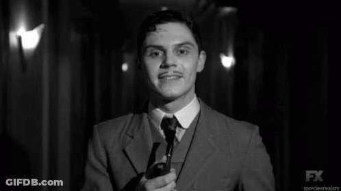 Black And White Man In Suit And Tie With FX GIF