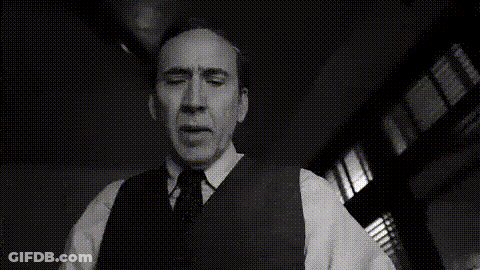Black And White Man In Suit And Tie With Woman GIF