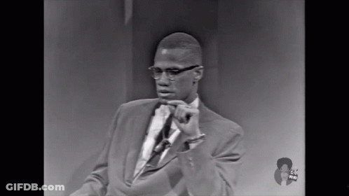 Black And White Man In Suit Giving Speech GIF