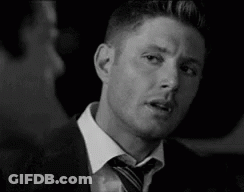 Black And White Man In Suit Making Funny Face GIF